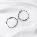 Stainless steel sun and moon magnetic couple bracelets detail, black white braided rope design. - Sun & Moon / 2-Piece Set / Black and White