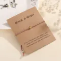 Minimalist woven cotton rope bracelet with a metal bead on wish card for women daily - Light Green (F7)