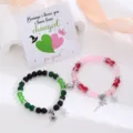 Wicked Musical Themen Pärchen Magnetische Perlen Armbänder mit Herz und Sternen Anhängern. - Stil B Perlenarmband Paar