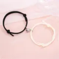 Couple magnetic heart braided bracelet set, simple black and white matching wrist jewelry. - Minimalist Black and Cream Pair