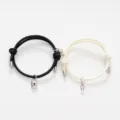 Couple magnetic distance bracelets set with lock and key charms, braided rope matching jewelry. - Key Lock Black And Off-White Pair