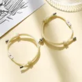 Couple braided rope bracelets with magnetic sun and moon charms for lovers and best friends. - Milan Cord Sun Moon Off-White Pair