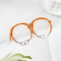 Bracelets de couple en corde tressée avec menottes magnétiques pendentif en alliage rouge et jaune. - Menottes Nouvelle Corde Rouge et Jaune Paire