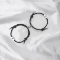 Couple magnetic bracelets with sun and moon charms, matching black braided rope. - Sun & Moon / 2-Piece Set / Black