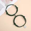 Magnetic couple bracelets with green braided rope and cute smiley face charms for lovers. - One Pair / Dark Green
