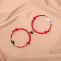 Matching magnetic red cord couple bracelets with yin yang design for lovers and friends. - Tai Chi Black White Magnet Red Pair