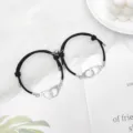 Couple magnetic attraction braided bracelets with metal handcuffs, stylish black rope for daily wear. - Handcuff Black Pair