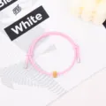 Pink braided rope bracelet featuring golden metal bead and silver tips for daily wear. - Gold Tungsten Carbide Bracelet (Metal End) / Pink