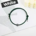 Dark green paracord bracelet with tungsten carbide bead and metal tips for daily wear and escape. - Tungsten Carbide Bracelet (Metal End) / Dark Green