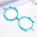 Bracciale intrecciato magnetico di coppia con ciondoli di montagna e mare in lega blu brillante. - Un paio / Blu lago