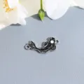 Alloy yin yang fish connector charm detail view, perfect for handmade DIY bracelets. - Black