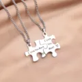 Stainless steel couple puzzle pendant necklace set with engraved love text for lovers. - Stainless Steel Chain Pair / Puzzle Necklace Model D (I love you more/most)