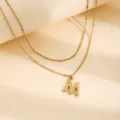 Collana con ciondolo lettera M in acciaio inossidabile placcato oro 18K doppio strato - Lettera A / Oro