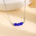 Collier chaîne en acier inoxydable avec perles œil-de-chat bleu, détail élégant. - Pierre d'œil de chat bleue / 1 Pièce / Argent