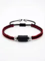 Bracciale intrecciato nero e rosso fatto a mano con pietra nera naturale e perle di metallo. - Nero rosso