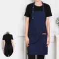 Blue canvas apron with adjustable 3-button halter neck and pocket for kitchen cooking work. - Dark Blue