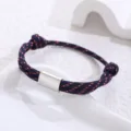 Handcrafted paracord bracelet with stainless steel tube, blue and red woven rope design for daily wear. - Red, White and Blue Paracord