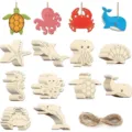 Decoupes d'animaux marins en bois brut avec cordes suspendues pour loisirs creatifs et fete. - Ensemble de 10 Pièces (10 Styles 1 Pièce Chacun + Corde) / Ensemble de 10 pièces