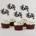 Close-up shot of black glitter boo cupcake toppers with spider web and bat designs for party. - BOO Letter Style / 12 Pieces/Pack-Assembled Finished Product
