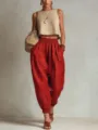 Gedetailleerde opname van casual linnen harembroek voor dames, hoge taille losse broek. - S / Rood