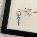 Exquisite spike pendant ear cuff featuring a stunning blue rhinestone for a bold and stylish look. - 3534 Blue Rhinestone (Single Piece)