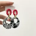Chic geometric acrylic earrings with red and black-white pattern circles for women. - Zebra Red