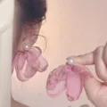 Close-up detail of fairy-style pink chiffon flower and pearl stud earrings for women. - Pink Pearl Fabric Clip-on Earrings(2118)