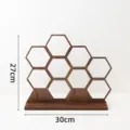 Wooden honeycomb earring display rack detail, hexagonal jewelry storage stand showcase. - Honeycomb Earring Rack
