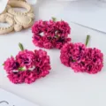 Detailed view of vibrant pink artificial silk flower clusters, perfect for DIY crafts and decor. - Rose Red