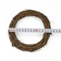 Natural rattan wreath ring detail shot for Christmas floral and rustic wedding decor. - 15cm