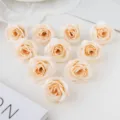Têtes de roses artificielles 4cm champagne fausses fleurs pour déco de mariage DIY. - Champagne