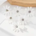White artificial daisy silk flower heads for DIY craft, clothing accessories and home decor. - White