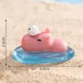 Figurine en résine de capybara rose mignon avec petit oiseau sur eau bleue pour mini déco. - N° 1 Capybara nageant