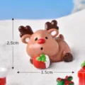 Linda estatuilla en miniatura de reno navideño de resina para decoración de macetas. - Abrazando Regalo Acostado / Aprox 3.5x2.5cm