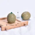 Miniature simulated fruit model ornament showing size detail for DIY dollhouse decoration. - Cantaloupe