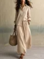Detailed view of the elegant beige linen blend shirt and wide leg trousers set for women. - S / Top And Bottom / Apricot