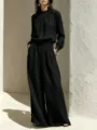 Detailed showcase of the elegant black cotton linen long sleeve top and wide leg pants. - S / Black