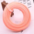 Detail view of 10mm thick fluffy chenille stems, perfect for DIY bouquet and craft projects. - 1m / Orange Pink