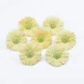 Closeup of artificial small daisy flower heads, soft yellow petals, ideal for gift box decor. - Latex Coated Miniature Daisy - Light Yellow