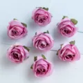 Künstliche Rosenblüten in Rosa, ideal für DIY-Bastelarbeiten, Kränze und Haarschmuck. - Fuchsia