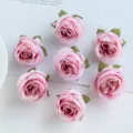 Künstliche rosa Rosenköpfe für DIY-Basteln, Hochzeitsdecorationen und Blumenarrangements. - Rosa