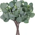 Artificial eucalyptus leaves bouquet detail view with white flower accents for decor. - Apple Leaves + Berries - Round Tip
