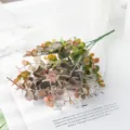 Artificial eucalyptus branches fake green plants for home decoration and window display. - Orange