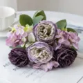Close-up of artificial purple peony and hydrangea bouquet, wedding floral detail backdrop. - Purple
