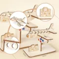 Wooden 3D airplane puzzle model DIY craft gift with suitcase and money holder details. - Natural Wood Color