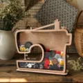 Wooden sewing machine storage box desktop display stand with colorful buttons for home decor. - Sewing Machine