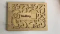 Wooden wedding guest book photo album with hollow carved design and metal binding rings. - Carved Pattern Wedding Style (LT140-5)