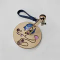 Portable wooden wrist yarn holder with cute cat design and blue leather strap for knitting - Blue Leather Strap