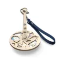 Portable wooden wrist yarn holder with blue leather strap, ocean shell print design. - Dark Blue Strap