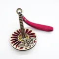 Portable wooden wrist yarn holder with pink leather strap and butterfly cutout base SKU - Pink Leather Belt